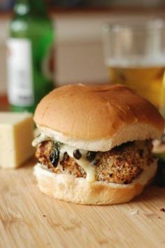 Thick turkey burgers topped with poblanos,,jalapeños and spicy cheese! www.lemonsforlulu...