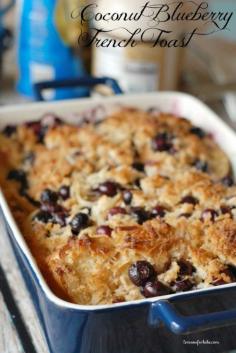 An easy and delicious over night baked french toast that is loaded with plump blueberries and lots of coconut! www.lemonsforlulu...