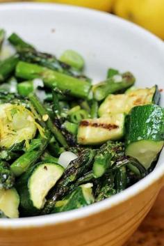 Fresh asparagus and zucchini are grilled, then tossed in a lemon and basil sauce with tangy garlic, and scallions.