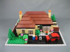 Super cute micro build of a house - love the roof!    Another mini LEGO house, via Flickr.