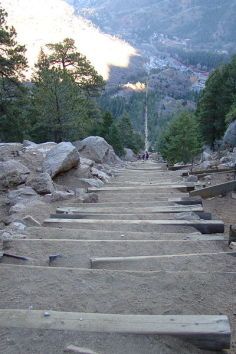 The Manitou Springs Incline, also known as the Manitou Incline or simply the Incline, is a popular hiking trail rising above Manitou Springs, Colorado, near Colorado Springs. The trail is the remains of a former incline railway whose tracks washed out during a rock slide in 1990. The Incline is famous for its sweeping views and steep grade, as steep as 68% in places, making it a fitness challenge. The incline gains over 2,000 ft of elevation in less than one mile.