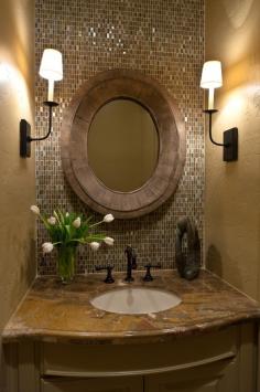 Take backsplash tile in the bathroom all the way up to the ceiling.