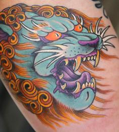 japanese-lion-tattoo meaning source: http://scroll-me.com/japanese-tattoo-inspiration-pictures/