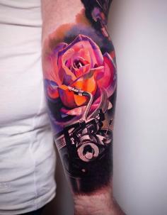 Rose tattoo on forearm