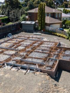 Since our inception in 1976, we have had an outstanding reputation for creating the kind of homes people fall in love with from the ground up. We take you through the exciting journey of building a quality home, guiding you at every step. As trusted Sloping Block Builders Melbourne, we understand that sloping sites or split-level sites can offer amazing views and vantage points. However, they require an expert approach from someone who is well-versed in dealing with drainage issues and engineering considerations that require seasoned expertise. We are skilled, qualified, trained, and fully licensed to deliver the highest standards.