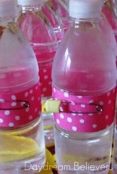 Bumble Bee, Spring, Baby Girl, Baby Shower / Baby Shower/Sip & See / Food & Drink: Water bottles were embellished with fun pink fabric and yellow diapers pins!