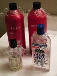 Put plastic wrap over the top of bottles to keep them from leaking. | 25 Mind-Blowing Tips That Will Change The Way You Pack For Travel