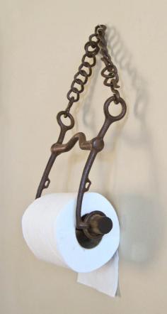 Repurposed bit for a rustic toilet paper holder