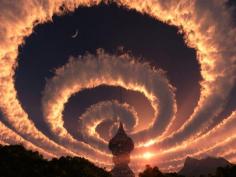 Cloud spiral in the sky. An Iridescent (Rainbow) Cloud in Himalaya. The phenomenon was observed early am 18 Oct 2009