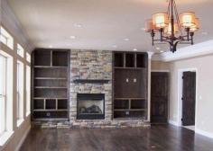 built-in shelves around fireplace | include wood like it comes with baubles and built in