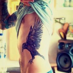Guy with crow tattoo