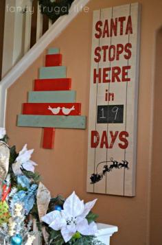 Santa stops here sign. I love the simplicity of this and how rustic it is. From Kirklands........D. (14-48-60)