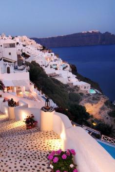 Santorini, Greece This at the top of my bucket list!  In fact if I don't make here before I die, just scatter my ashes here; that'll work for me!