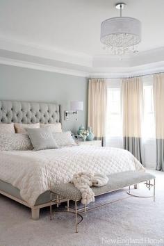 Romantic and serene master bedroom. Love the color block curtains, headboard and overall color scheme.