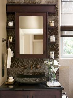 brown bathroom....like the mirror & the tile backsplash