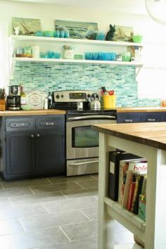 gorgeous kitchen redo- wait til you see the before!!!  painted cabinets, diy backsplash, and industrial shelving help save money