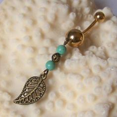 Gold Belly Button Ring - Piercing - Curved Barbell - Navel Piercing - Antiqued Brass Fancy Leaf With Magnesite. $11.00, via Etsy.