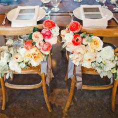 Gasp! Ombre flower chair decor for the bride and groom. Photo by: The Nichols Photography