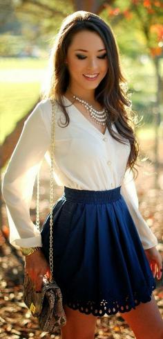 Stunning white blouse with front buttons and mini skirt! #ootd #fashionista
