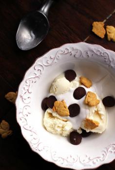 Graham cracker infused ice cream is topped with marshmallow sauce and chocolate chips, making a s’mores ice cream sundae that will soon become your favorite summer treat!