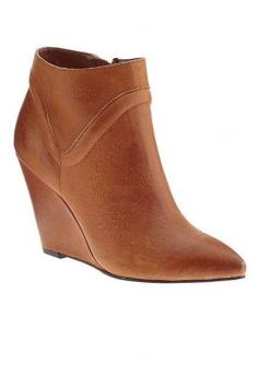 These tan brown wedge booties with the pointed toe are adorable! Love the wedge heel on these ankle boots, perfect with a cute skirt, dress, or pants for fall, winter and spring 2013 - 2014 ♥ Get this look at @SPARKTREND for $30, click the image to see! #ankle #boots #booties #wedges #shoes #womens #fashion