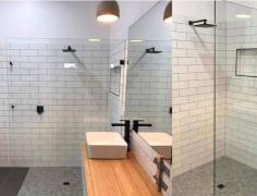 The final steps of our kitchen and bathroom renovations in Melbourne include the completion of carpentry, electrical and tiling ready for handover. Step 3: Carpentry – Once the removal of the bathroom or kitchen is completed, our team can start focusing on the carpentry items required for the project. We finish the carpentry by adding any mount points along with doors, towel rails, toilet rolls and windows. Step 4: Electrical – This step will include the completion of lights, fans, power points and more, all aligning with Australian Industry Standards. We commission qualified and skilled electrical partners to complete all the wiring. Step 5: Waterproofing & Tiling – Ceiling, floor and wall sheeting is installed once everything is double-checked. After the sheeting, everything is waterproofed, then tiles are placed. Step 6: Final Inspection & Handover – After a detailed final inspection, we hand over your new bathroom or kitchen!
